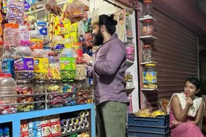 Yash purchases candy from roadside shop
